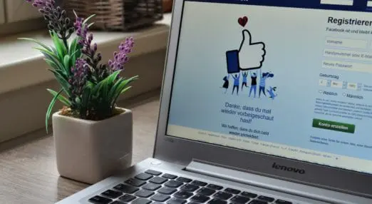 laptop with facebook website open