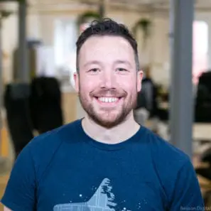 Tom smiling at the camera