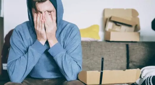 Person with head in hands