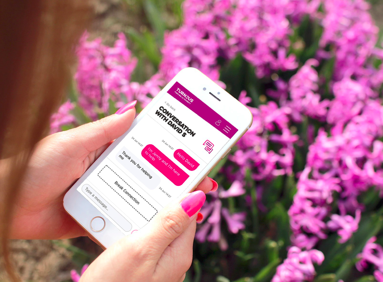 Connect app being used in someone's hand