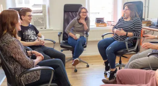 bethan, ian, jo and annie sitting and chatting