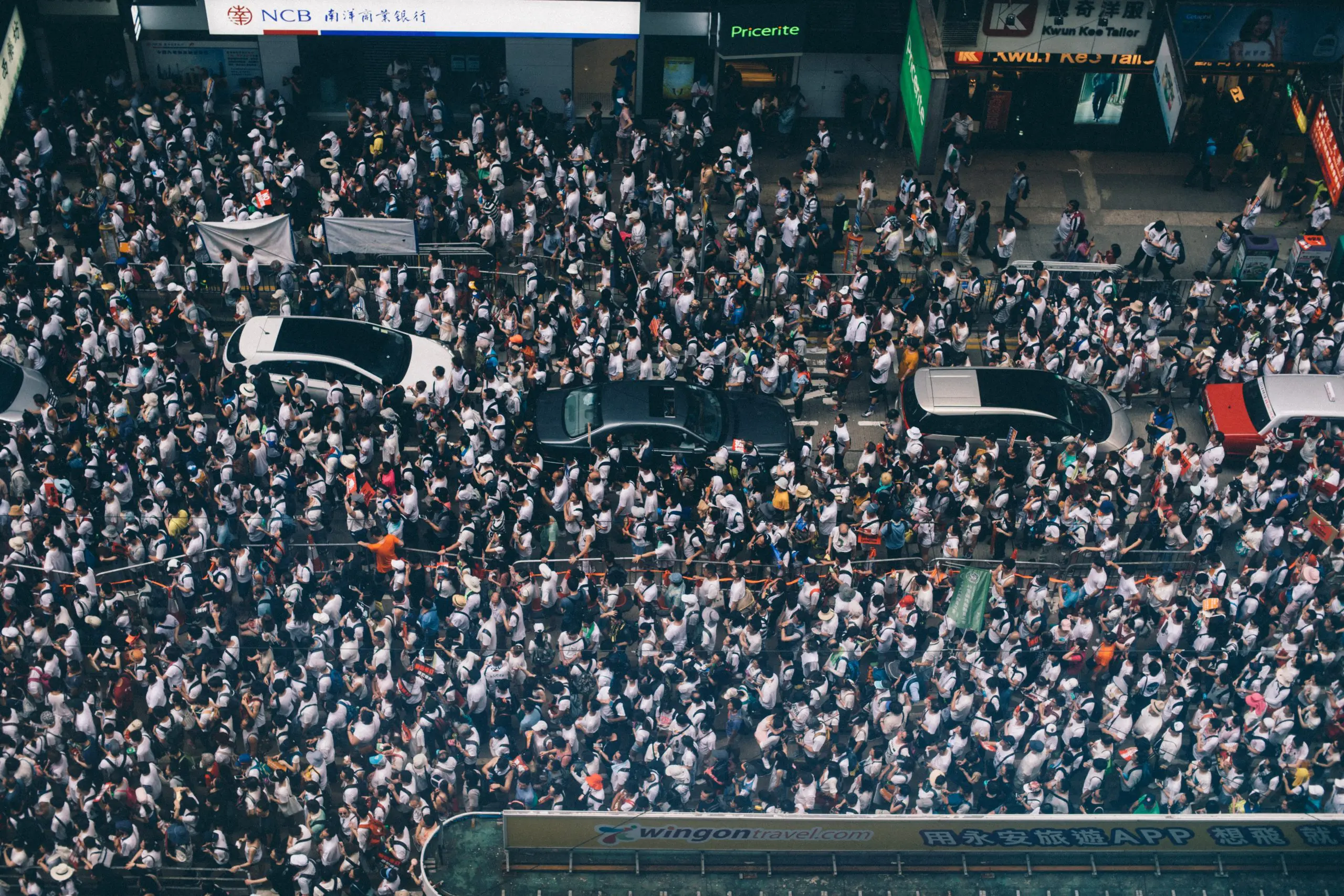 a large crowd on a city street