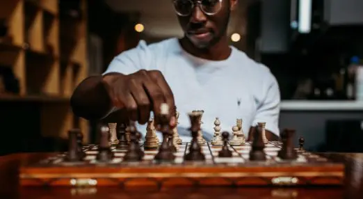young man playing chess
