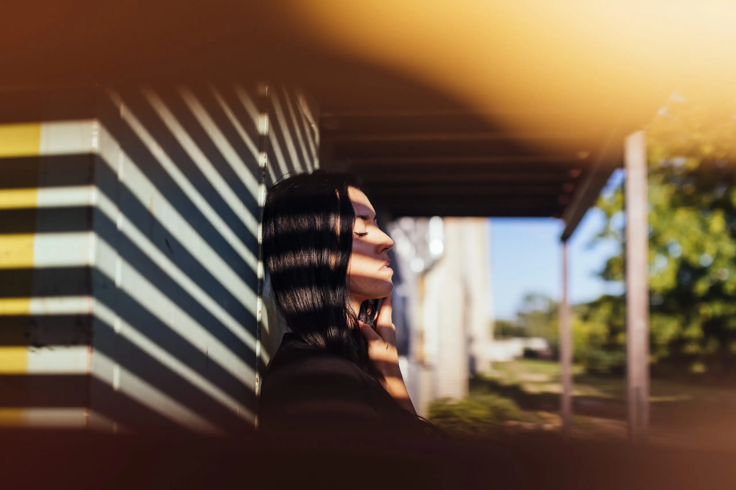 woman with shadows over her face