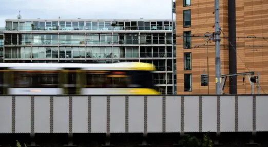 A tram moving across the screen