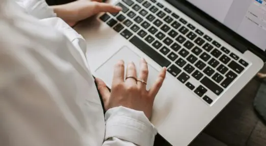 writing a brief on a laptop