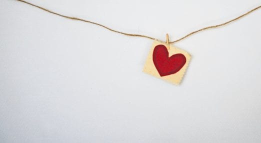 fabric heart pegged onto a string