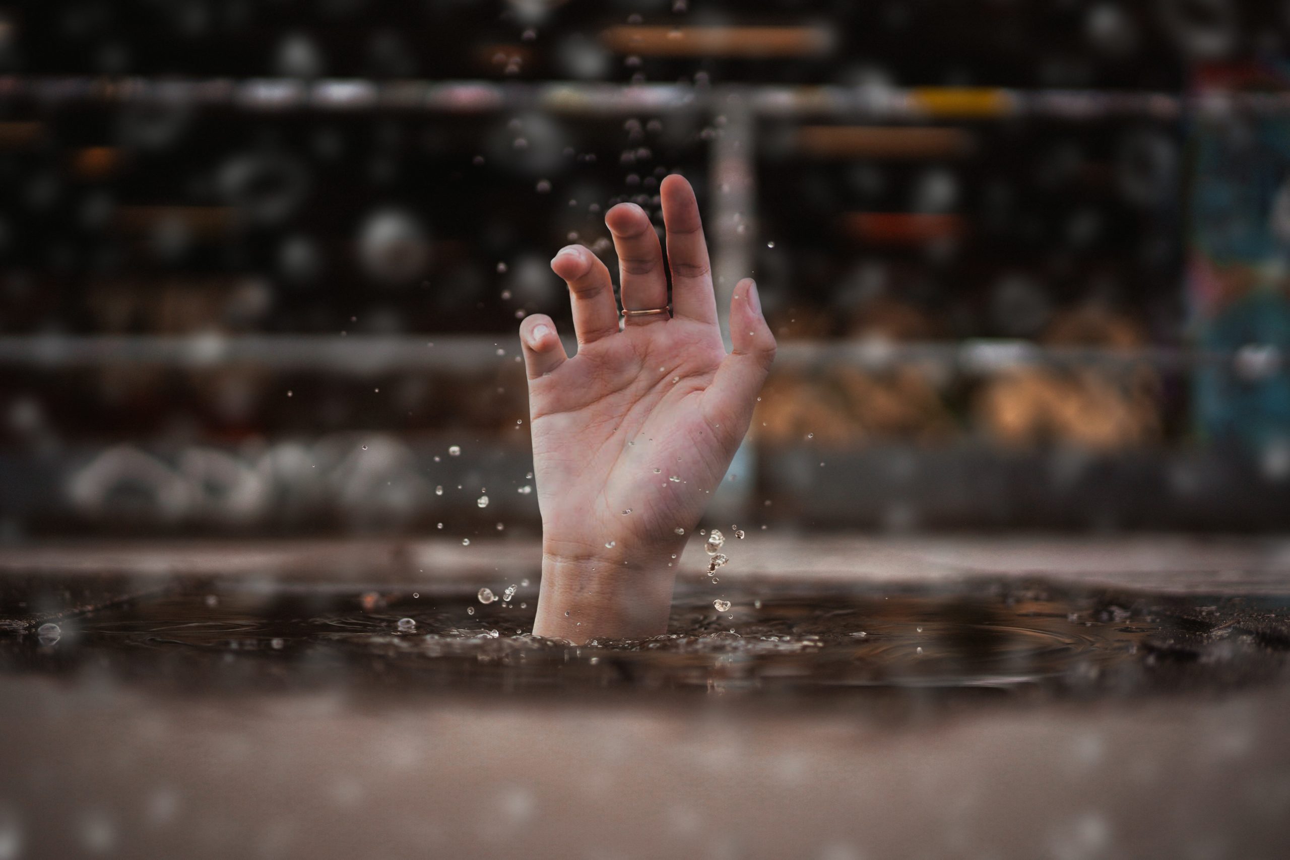 hand emerging out of water