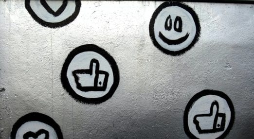 social media icons painted on a metal surface