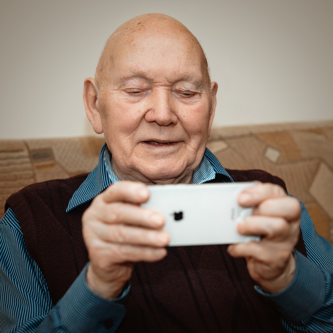 older man on phone