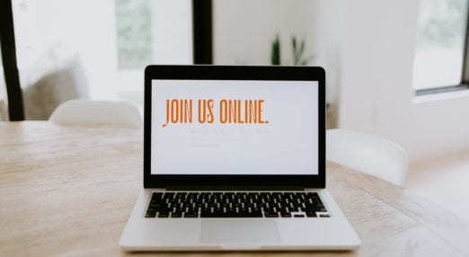 laptop showing the words 'join us online'