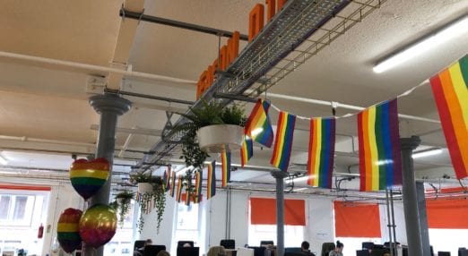 rainbow pride bunting hanging in office