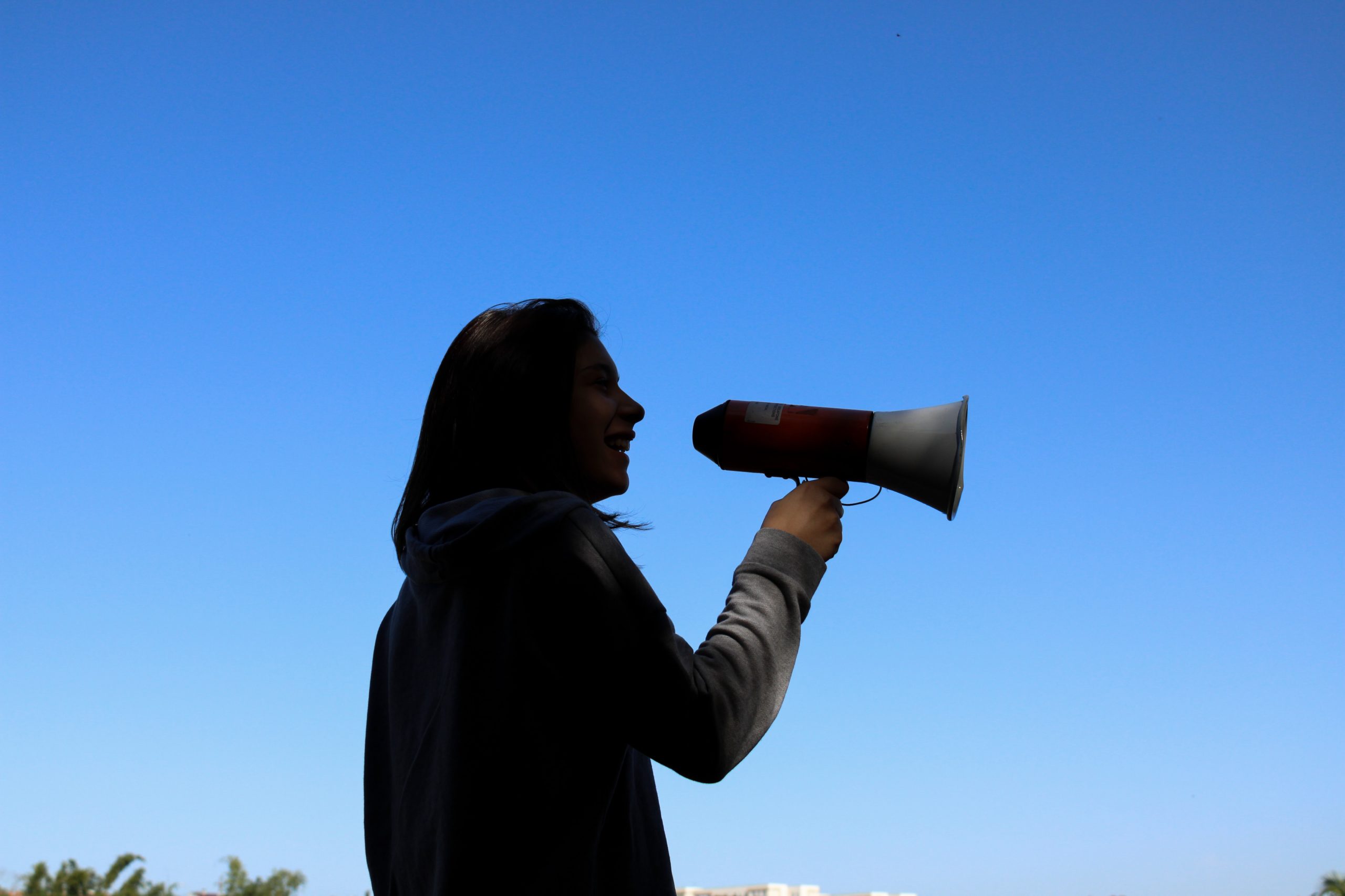 woman holding megaphone