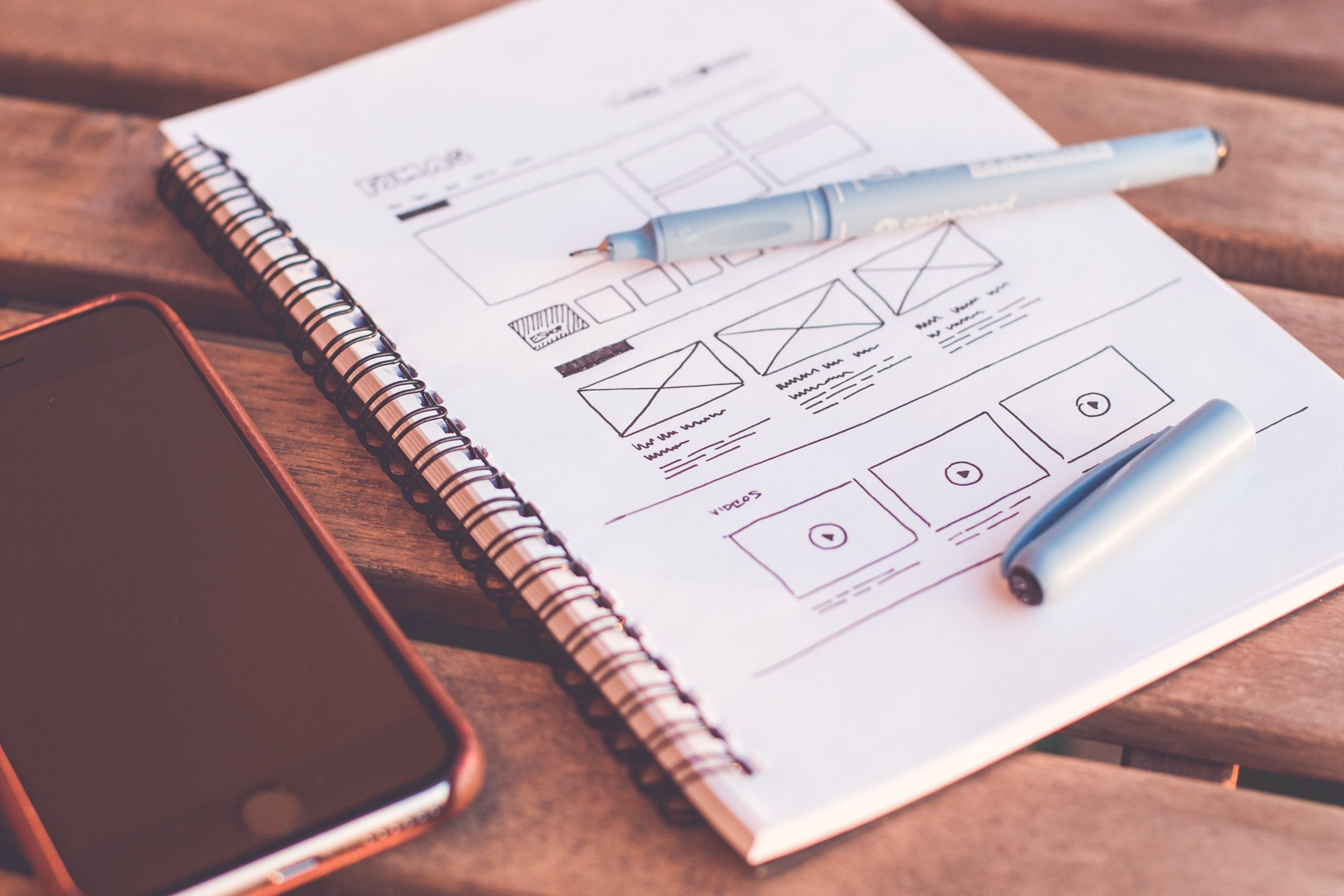 notebook showing a wireframe design