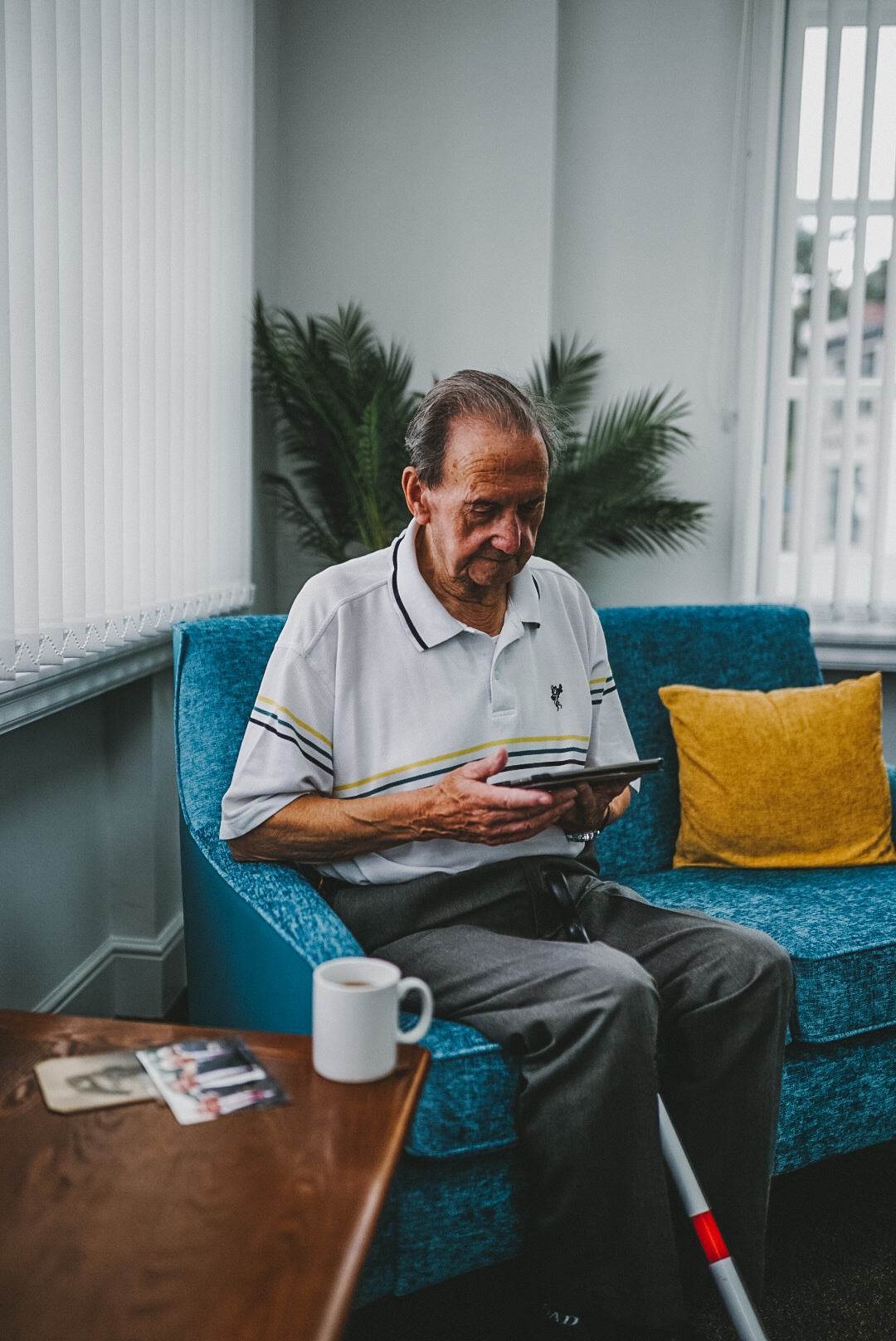 Blind veteran fred using a tablet